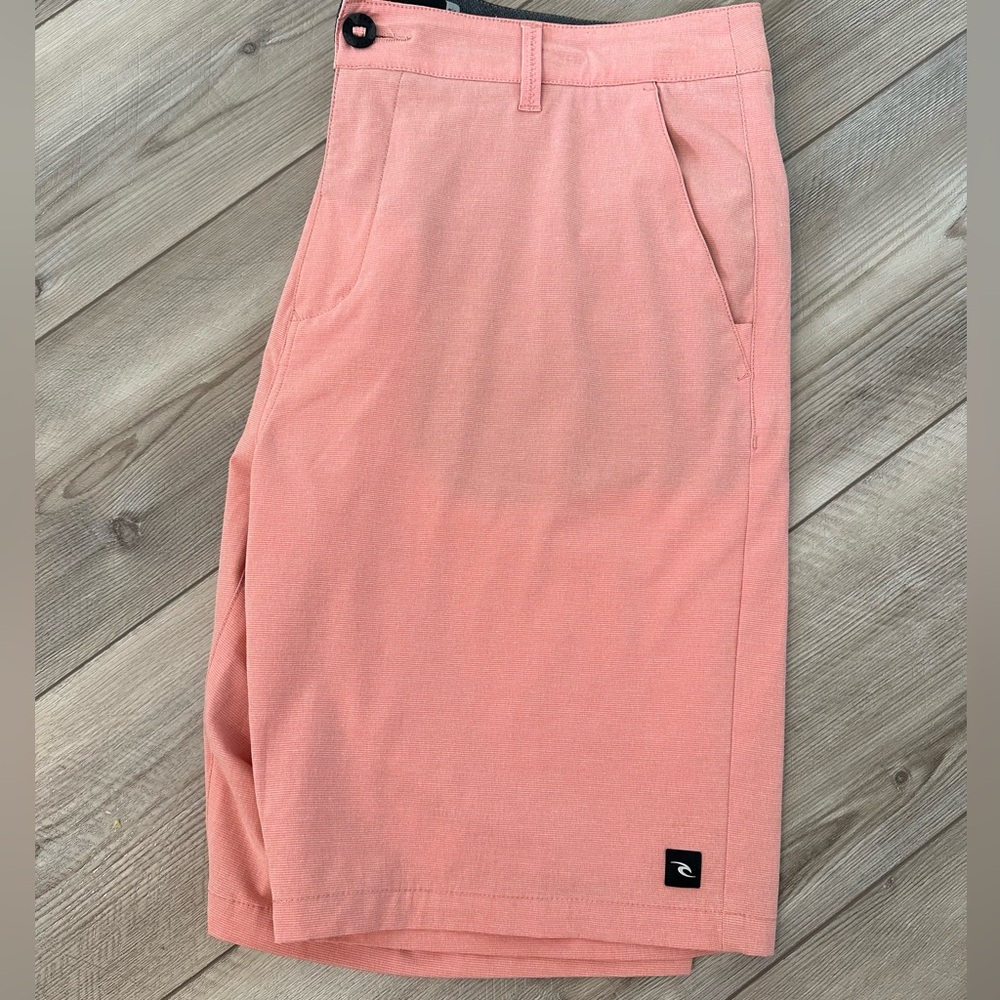 Men’s rip curl boardwalk shorts. Peach color.